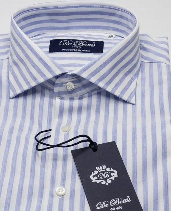 Regular fit 100% cotton shirt. White color with blue stripes. From size 39 to 45.